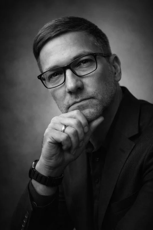 Create a professional Prompt A person is captured in a conte